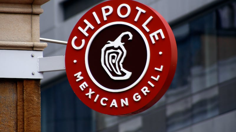FILE - A sign for the Chipotle restaurant in Pittsburgh's Market Square is seen on Feb. 8,...