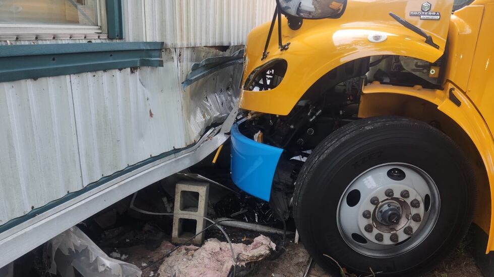 School bus carrying 40+ students crashes into Orangeburg County home