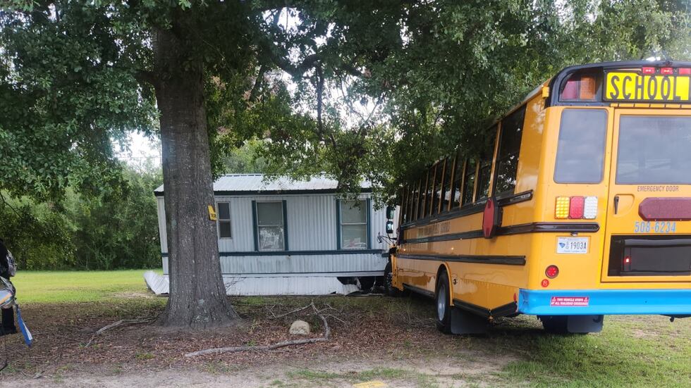 School bus carrying 40+ students crashes into Orangeburg County home